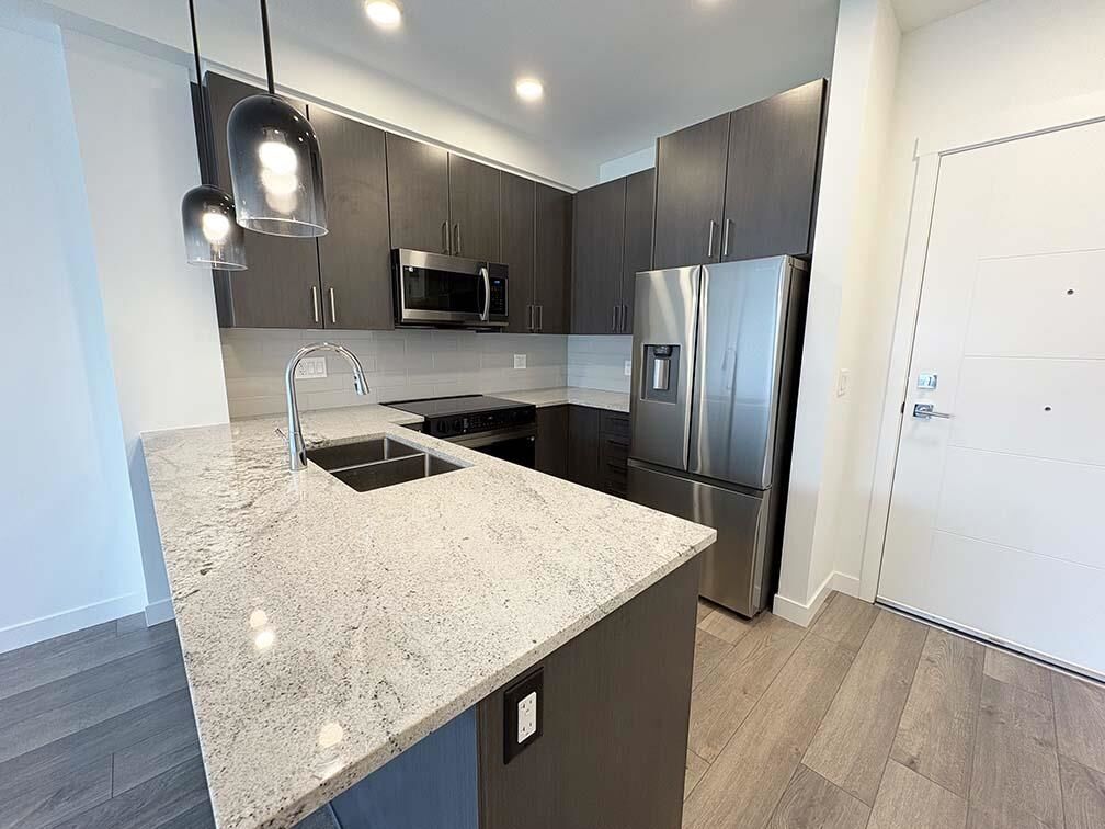 Property Photo:  5504 Brydon Crescent 203  BC V3A 0R3 