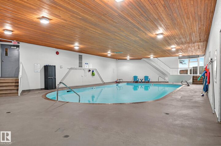 Property Photo: 5125 Riverbend Road NW 106 AB T6H 5K5