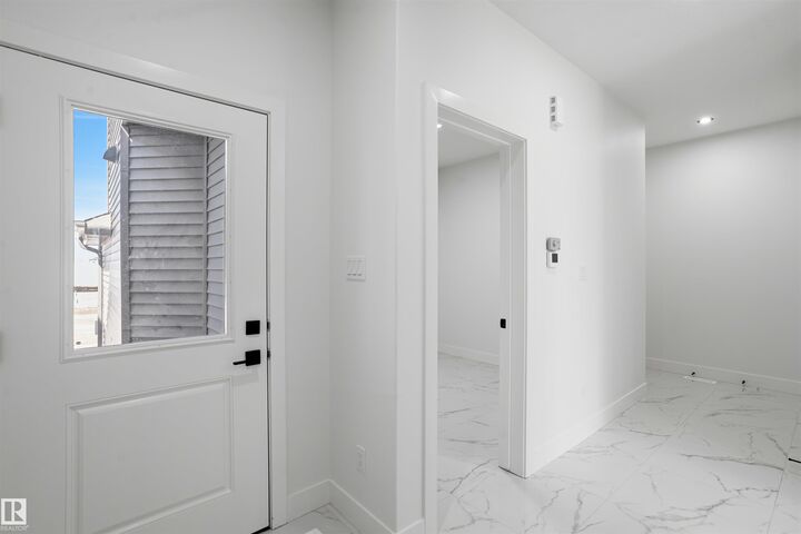 Property Photo: 1523 208 Street NW AB T6M 3N8