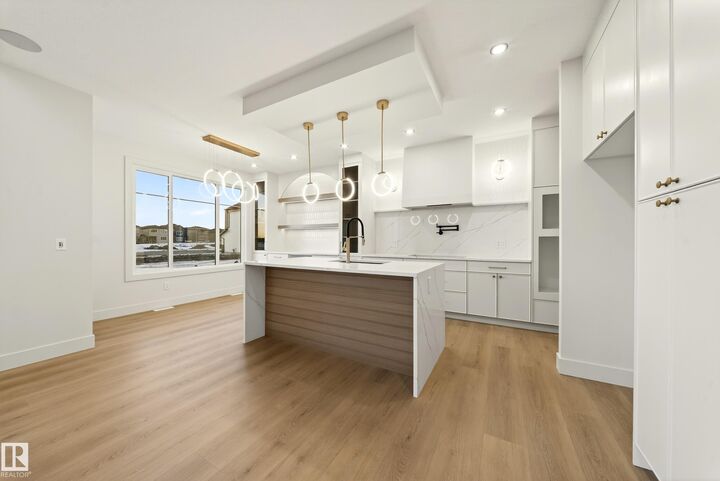 Property Photo: 4276 Charles Close SW AB T6W 1A7