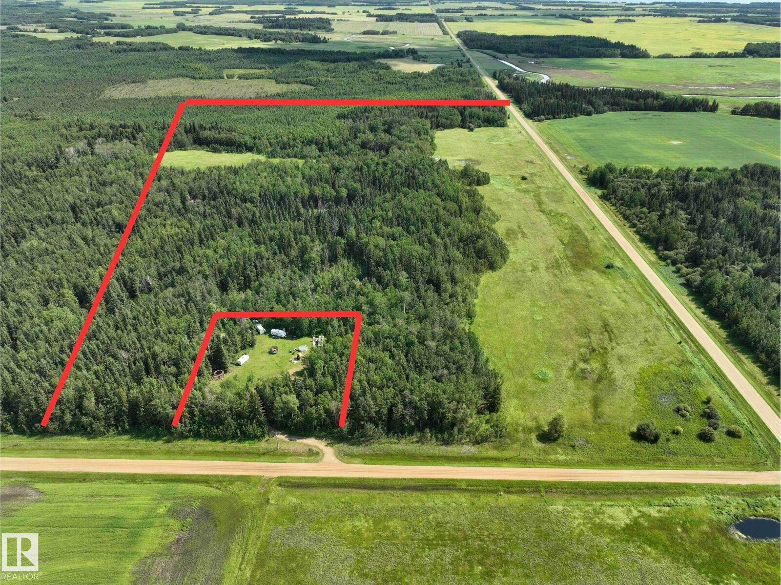 Property Photo: 210054 Twp Rd 660 AB T9S 2A4