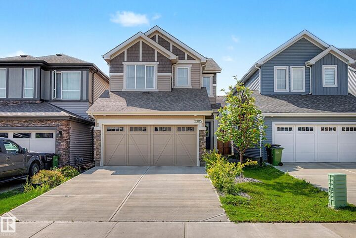 Property Photo:  23015 96 Avenue NW  AB T5T 7R4 