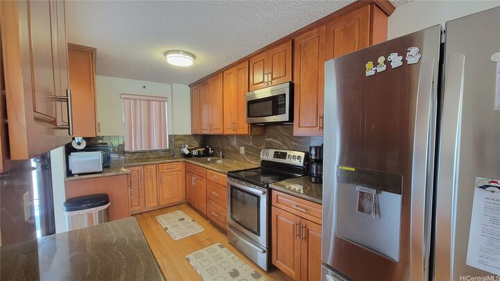 Property Photo:  98-351 Koauka Loop C1803  HI 96701 