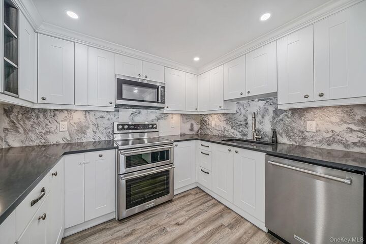 Property Photo:  457 Peconic Street  NY 11779 