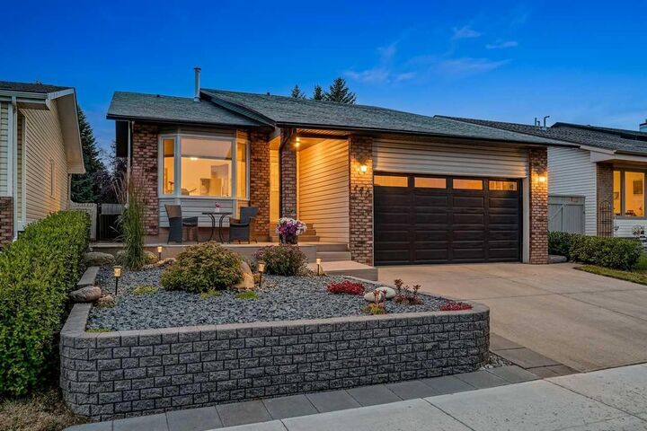 Property Photo: 140 Woodglen Way SW AB T2W 4T3