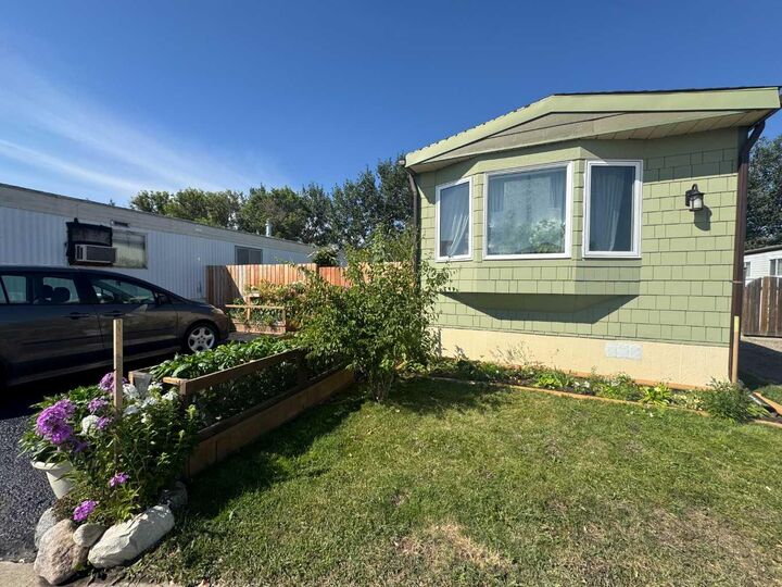 Property Photo:  2715 Westside Drive W 53  AB T1J 4M9 