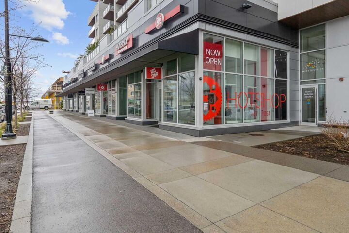 Property Photo: 8445 Broadcast Avenue SW 215 AB T3H 6B6