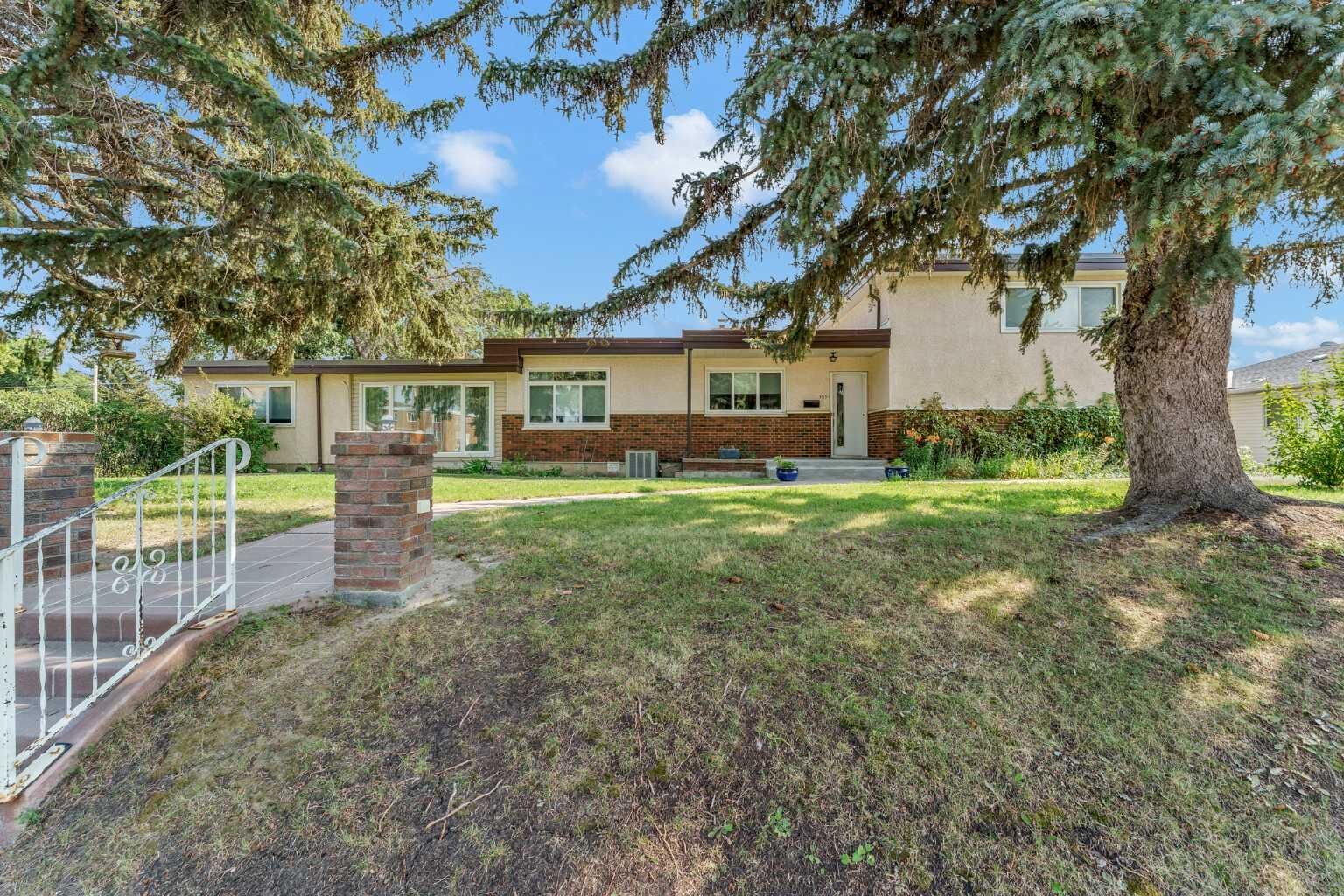 Property Photo: 303 10 Street SW AB T1A 4R3