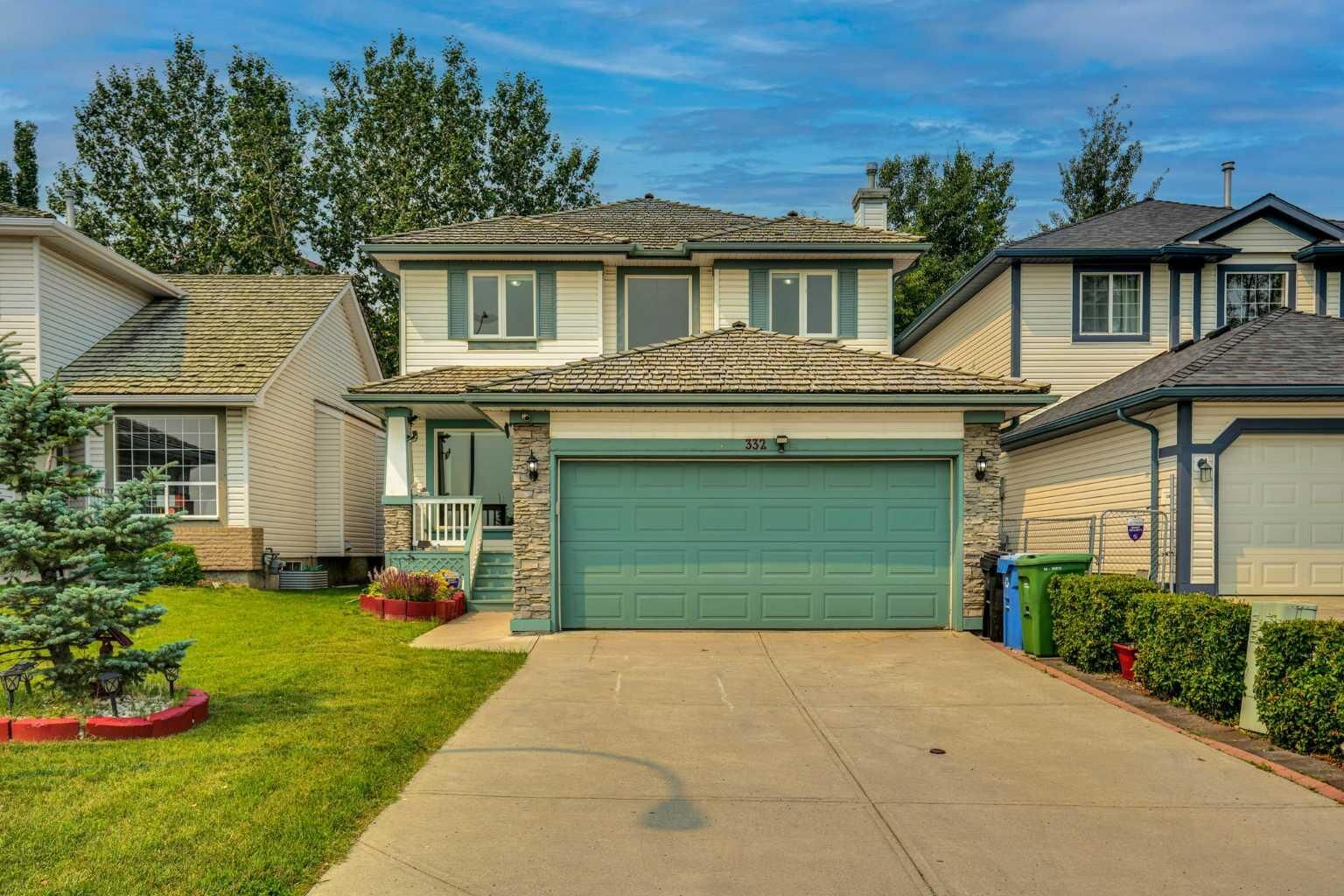Property Photo: 332 Harvest Hills Drive NE AB T3K 4H7