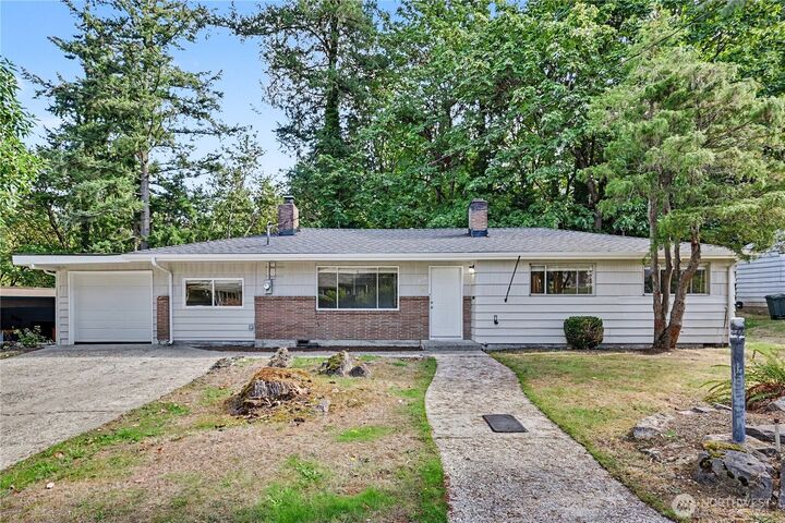 Property Photo:  4530  151st Avenue SE  WA 98006 