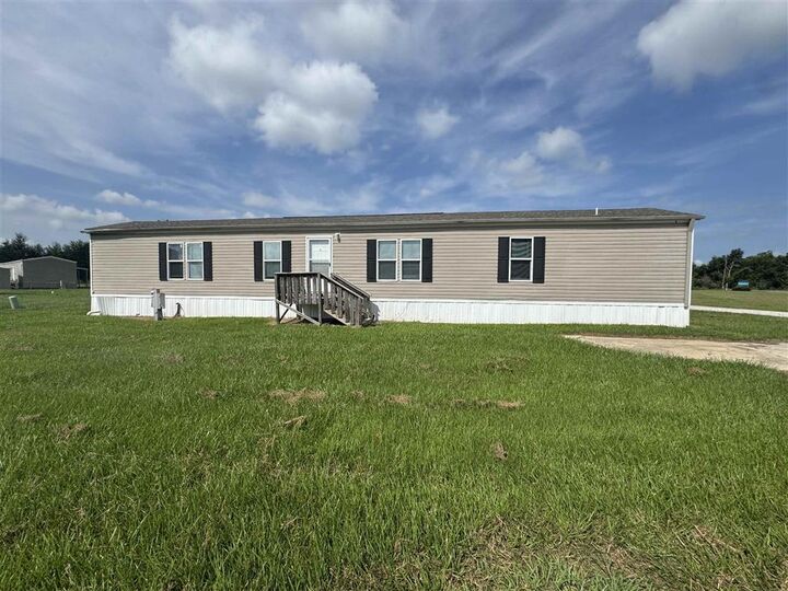 Property Photo:  583 I-10 Mobile Village Road 54  LA 70615 
