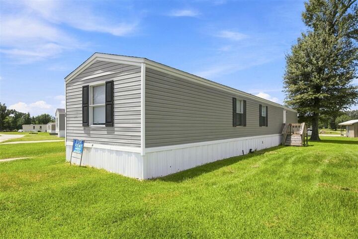 Property Photo:  583 I-10 Mobile Village Road 58  LA 70615 