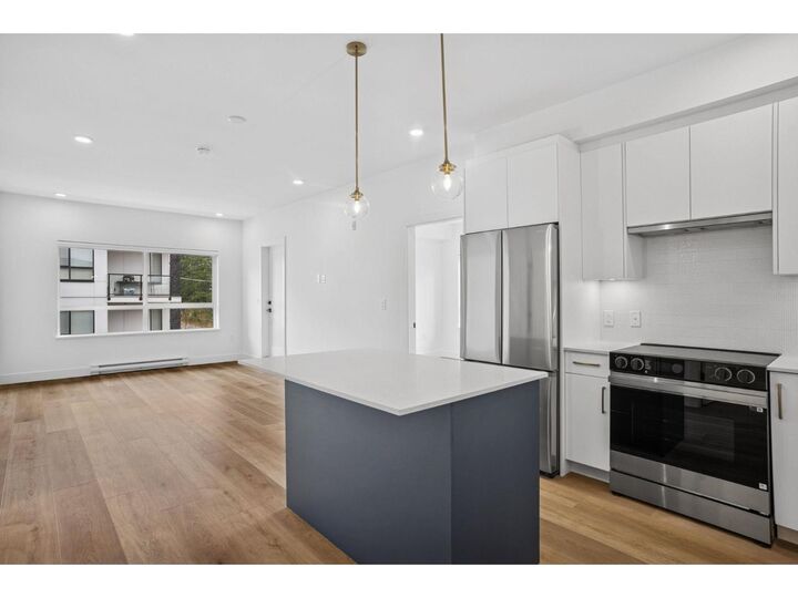 Property Photo:  20286 72B Avenue 305  BC V2Y 1T2 