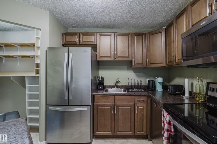 Property Photo: 10149 Saskatchewan Drive NW 1002 AB T6E 6B6