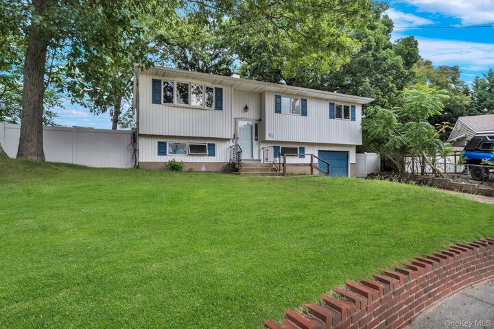 Property Photo:  21 University Drive  NY 11779 