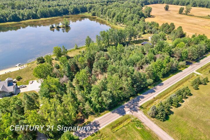 Property Photo:  Lot 2 Swan Creek Road  MI 48626 