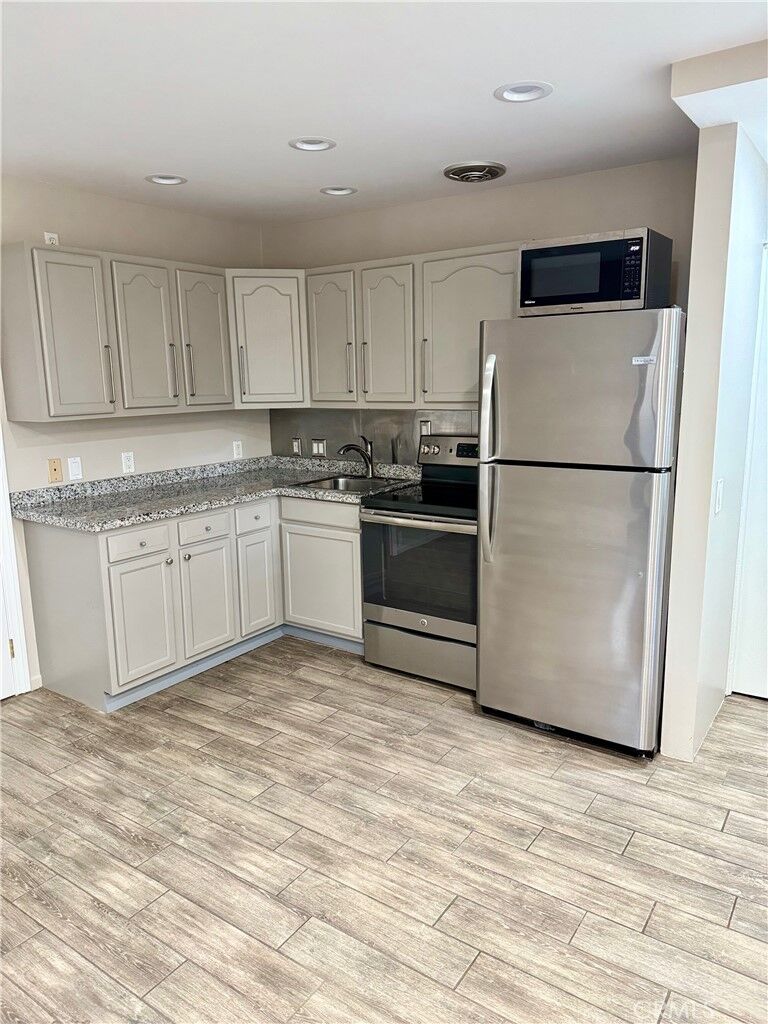 Property Photo:  437 Cypress Drive A  CA 92651 