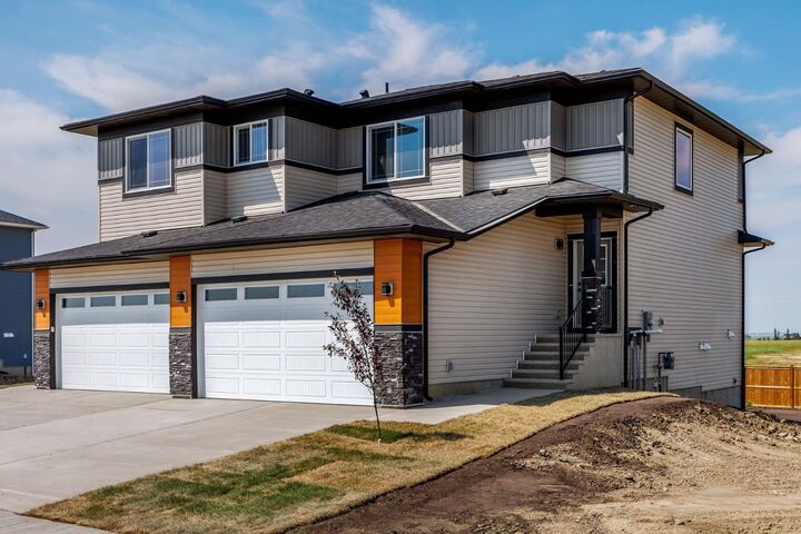 Property Photo: 140 Lakewood Crescent AB T1P 0G6