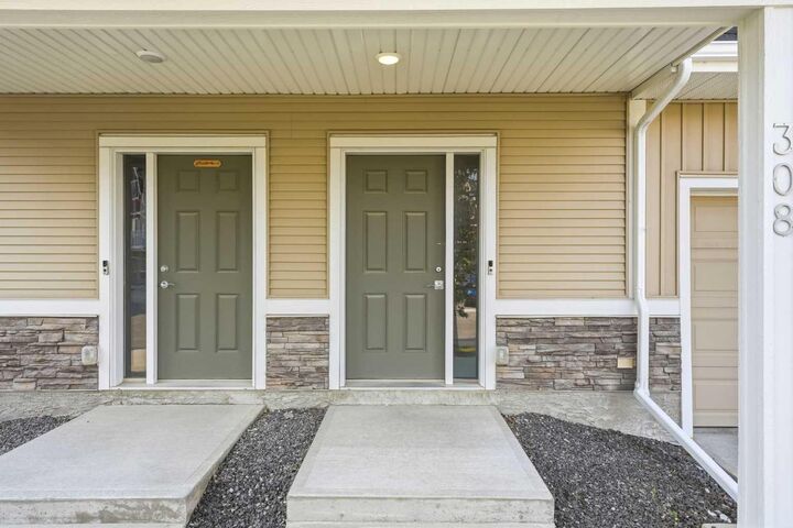 Property Photo: 32 Red Embers Parade NE 308 AB T3N 1P7