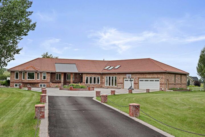 Property Photo: 242125 8 Street E AB T1S 3L2
