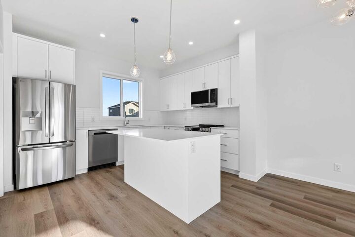 Property Photo: 12 Hotchkiss Parade SE AB T3S 0X5