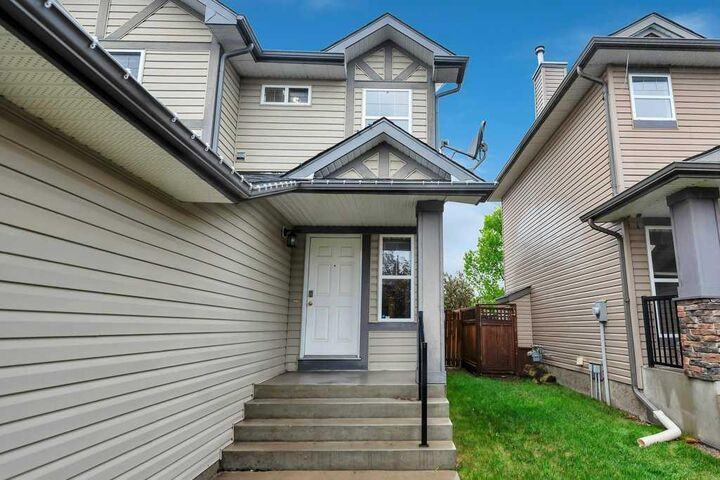 Property Photo: 142 Ranch Ridge Court AB T1P 0A5