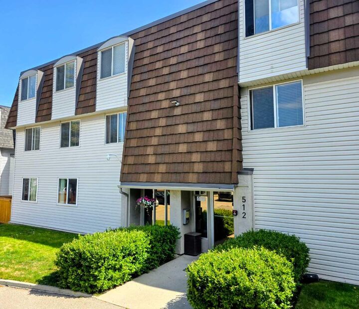 Property Photo:  512 Cedar Crescent SW 201  AB T3C 2Y8 