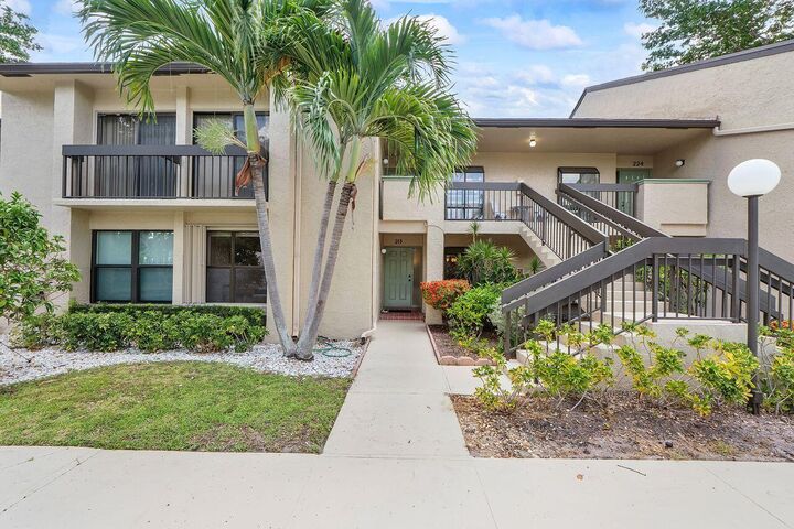 Property Photo:  5055 Oak Hill Lane 213  FL 33484 