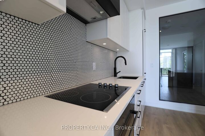 Property Photo: 899 Queen Street E 410 ON M4M 0C8
