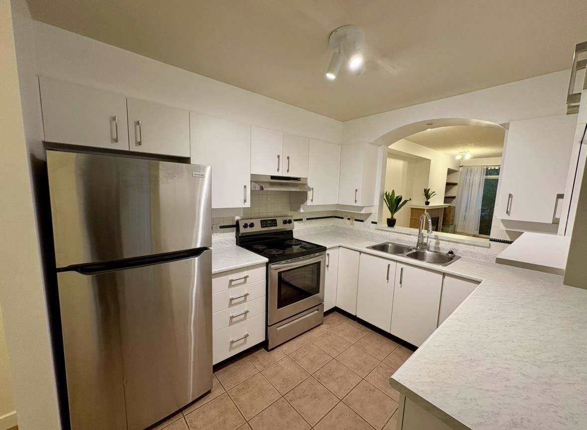 Property Photo: 3600 Windcrest Drive 212 BC V7G 2S5