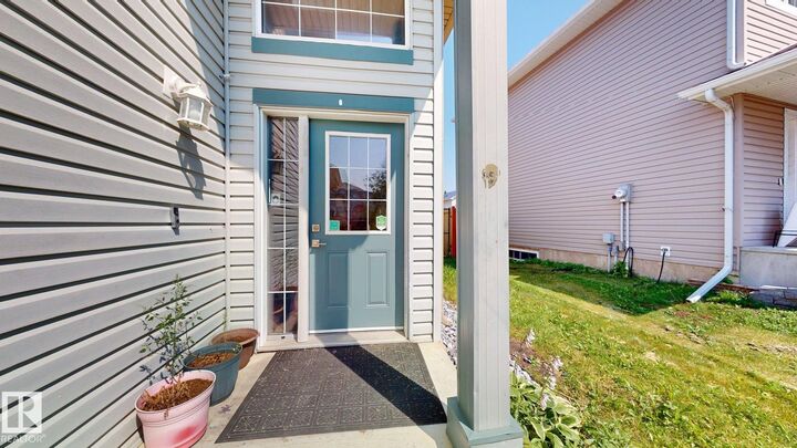 Property Photo:  7848 7 Avenue SW  AB T6X 1N3 