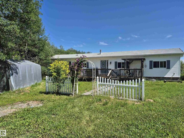 Property Photo:  463051 Range Road 64  AB T0C 0T0 
