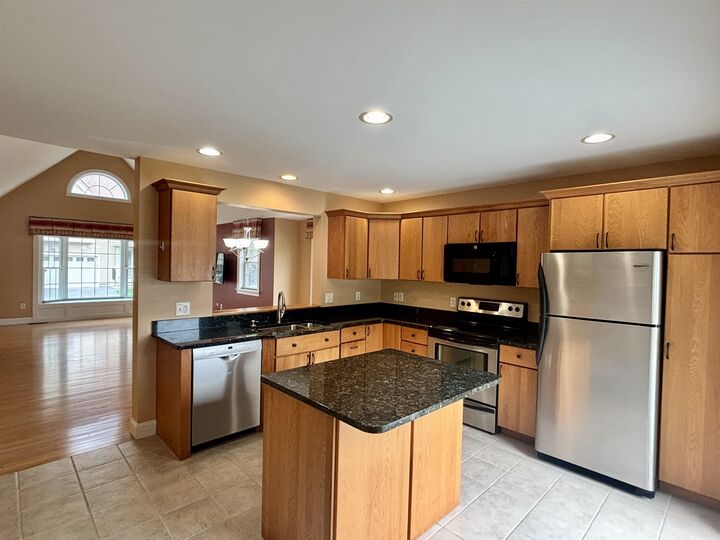 Property Photo:  19 Town Village Drive  NH 03079 
