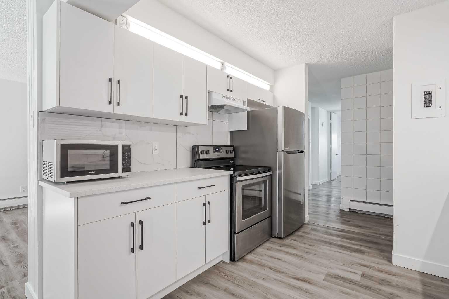 Property Photo: 6919 Elbow Drive SW 113 AB T2V 0E6