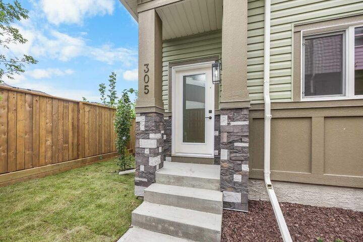 Property Photo: 67 Panatella Square NW 305 AB T3K 2S7