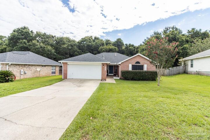 Property Photo:  1053 Brownfield Rd  FL 32526 