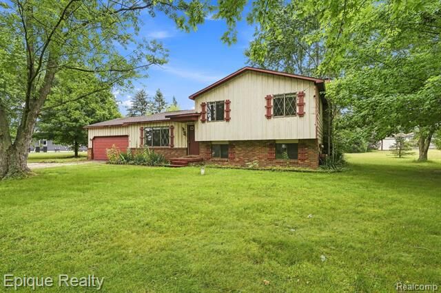 Property Photo:  8534 Tim Tam Trail  MI 48433 
