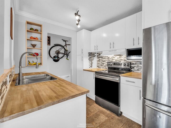 Property Photo: 2222 Cambridge Street 306 BC V5L 1E6