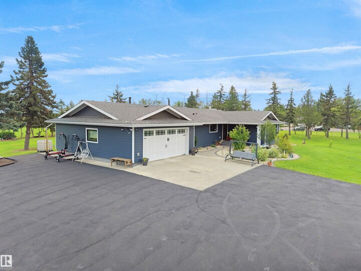 Property Photo: 1150-50242 Rge Rd 244A AB T4X 0P4