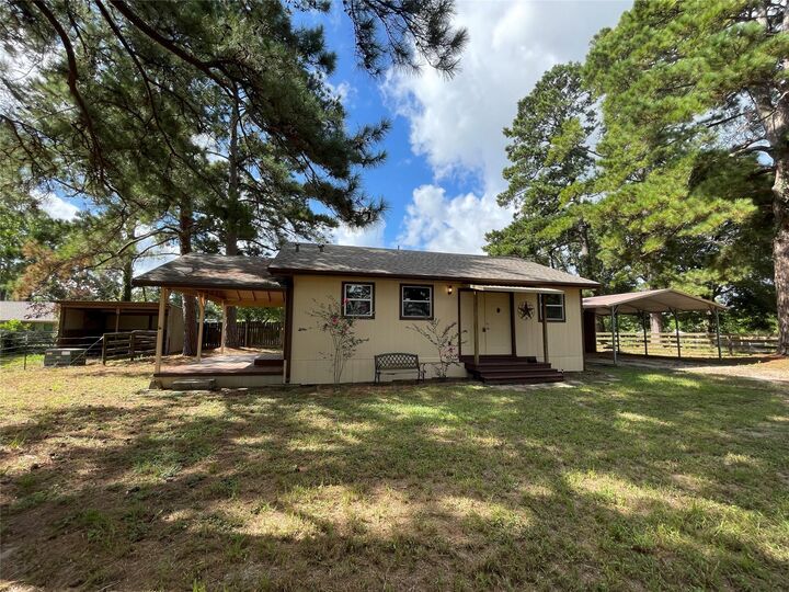 Property Photo: 19435 Keenan Cut Off Road TX 77316