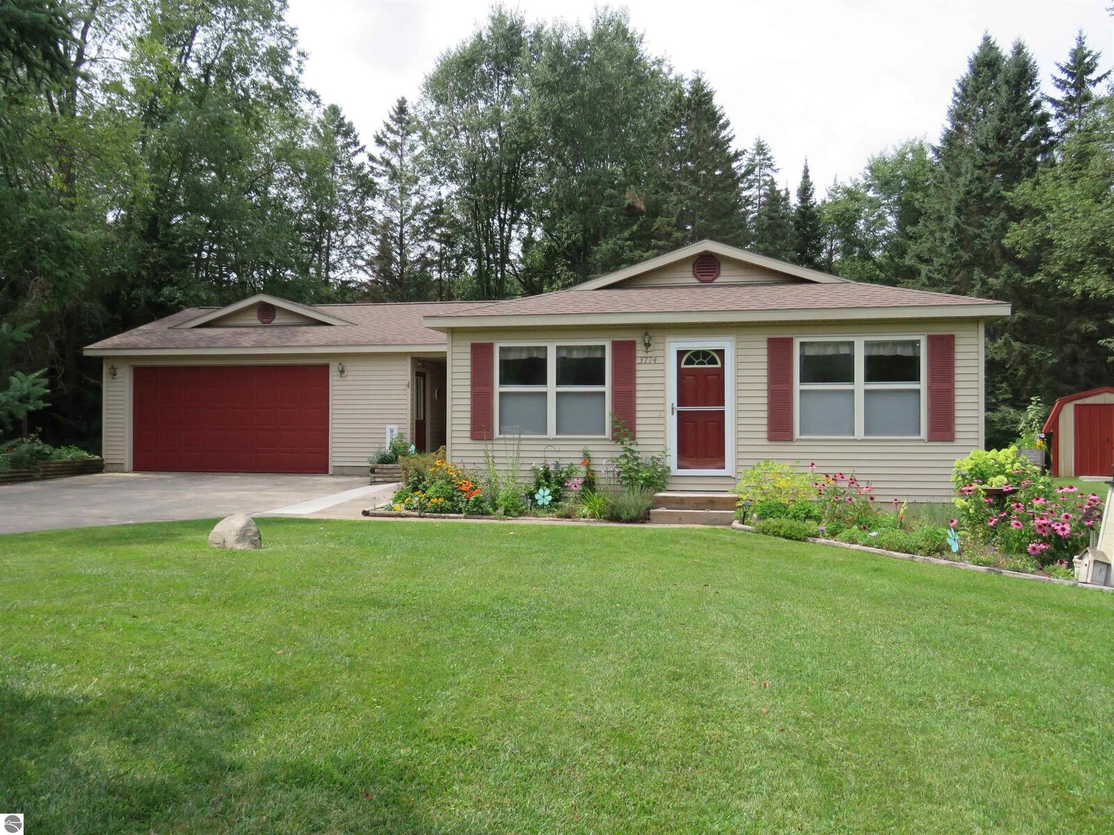 Property Photo:  3774 Driftwood Drive  MI 49601 