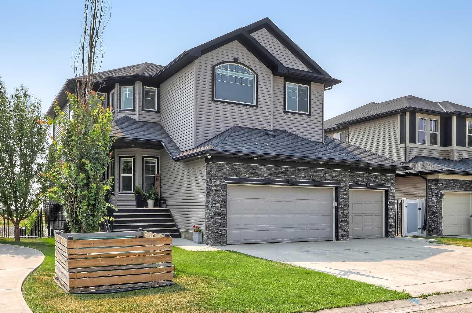 Property Photo: 268 Rainbow Falls Way AB T1X 0T1