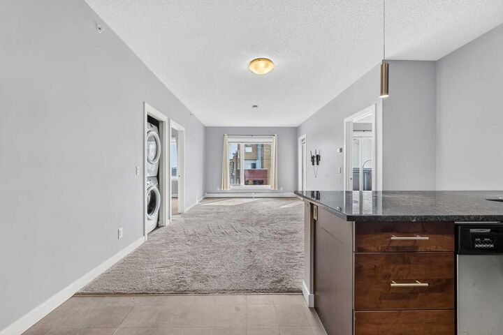 Property Photo:  604 East Lake Boulevard NE 2405  AB T4A 0G6 