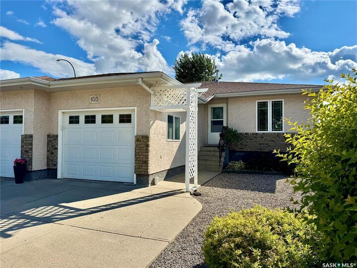 Property Photo:  105 Russell Drive  SK S3N 4E8 