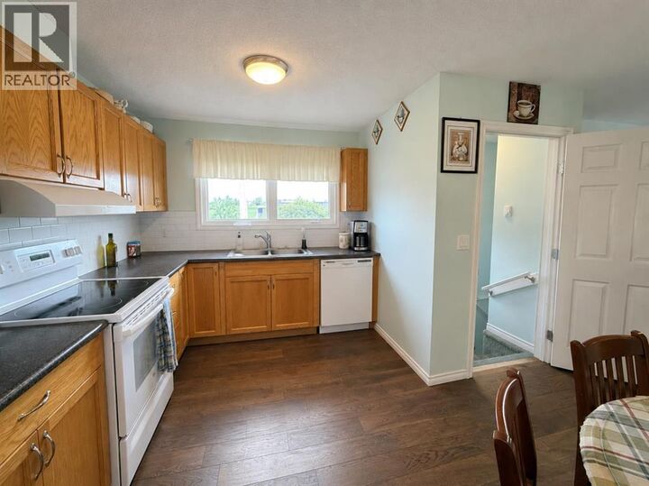 Property Photo: 215 14 Street AB T9W 1G4