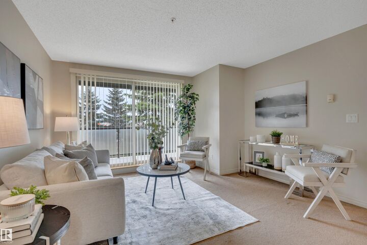 Property Photo:  13907 136 Street NW 205  AB T6V 1Y5 