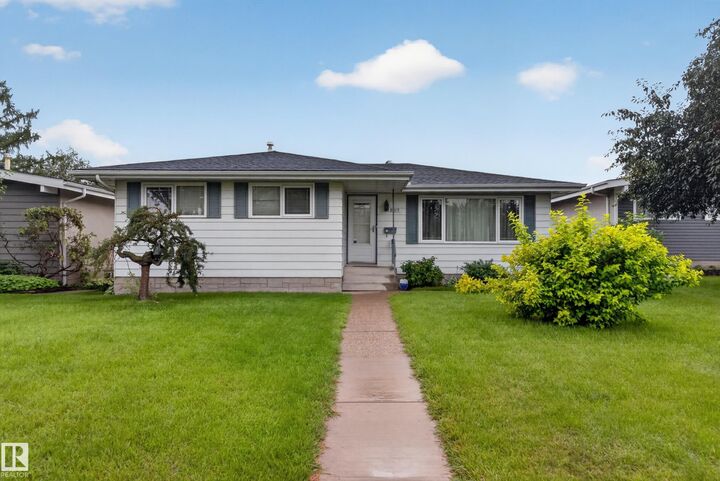 Property Photo:  8015 145 Avenue NW  AB T5C 2S8 