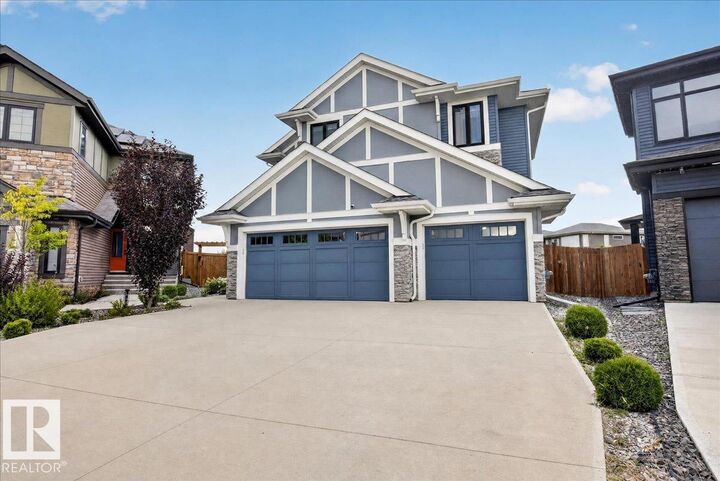 Property Photo: 6813 Knox Loop SW AB T6W 4R3