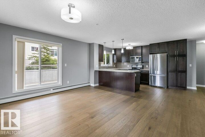 Property Photo:  2203 44 Avenue NW 117  AB T6T 0T1 