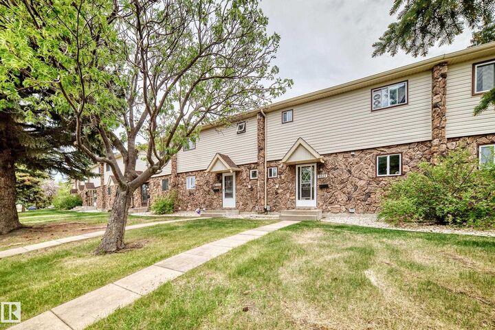 Property Photo:  9323 Morinville Drive  AB T8R 1J9 